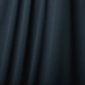 Black fabric with soft folds and lines.