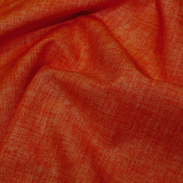 Close-up of vibrant orange fabric texture