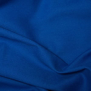 Close-up of blue fabric with folds.