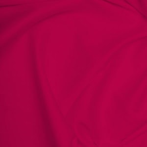 Vibrant red fabric with soft folds