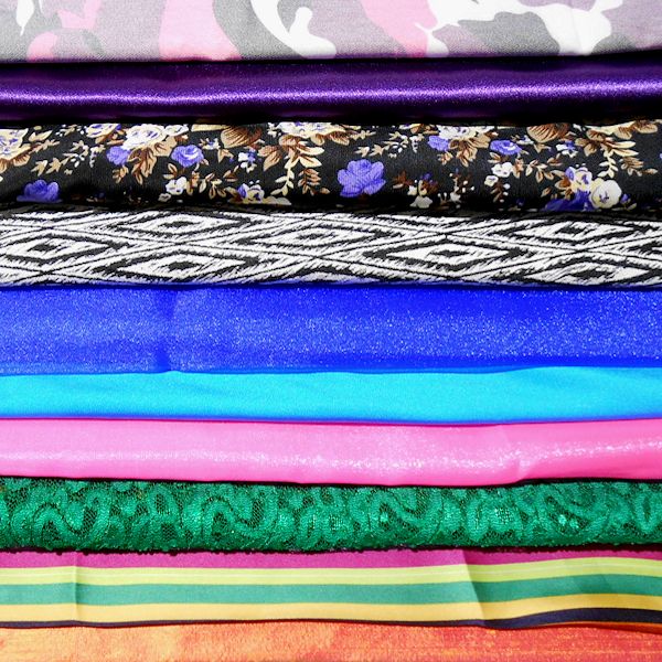 Stacked colourful fabric with various patterns