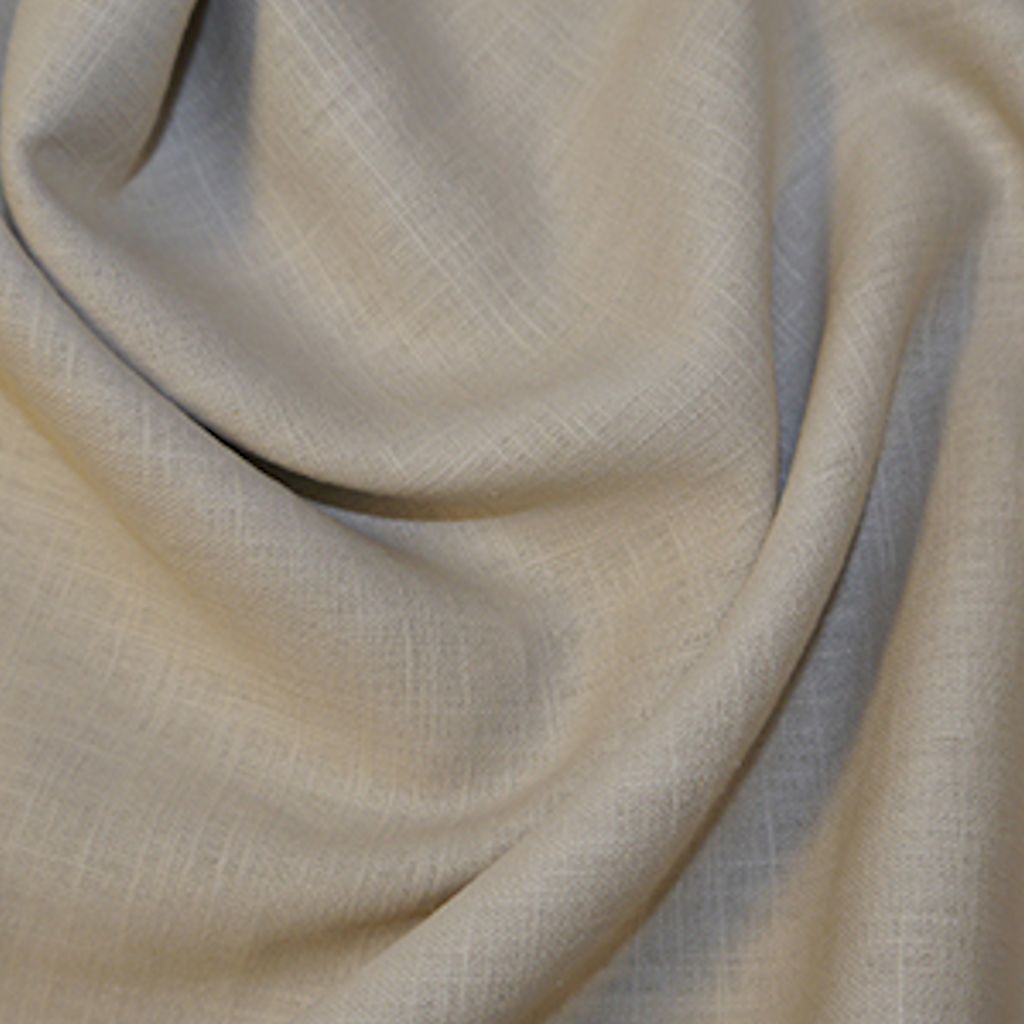 Close-up of beige fabric with soft folds