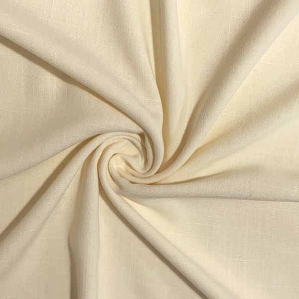 Beige fabric swirled in a spiral pattern.