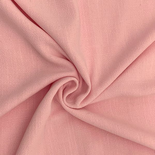 Soft pink fabric in spiral pattern