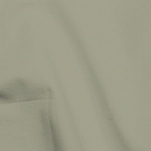 Close-up of beige linen fabric texture.