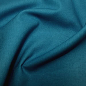Close-up of teal fabric texture and folds.