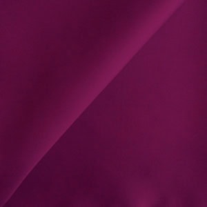 Ruby red fabric texture close-up