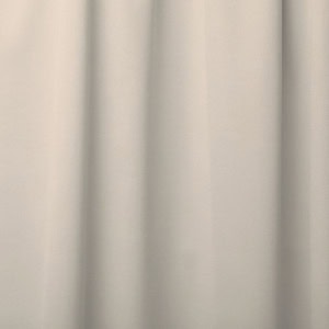 Beige curtain with soft folds