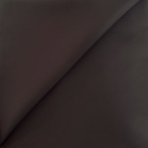 Dark brown fabric folded diagonally