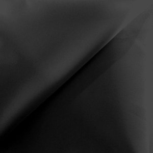 Close-up of black fabric with shadow