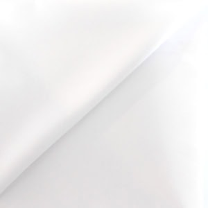 Smooth white fabric close-up view.