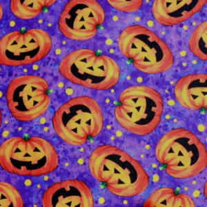 Orange pumpkins pattern on purple background.