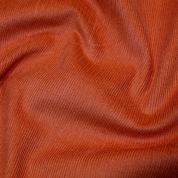 Close-up of red, textured fabric wrinkle
