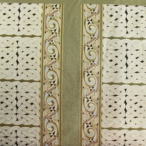 Ornate Celtic knot embroidery on fabric.