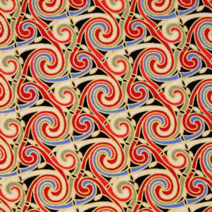 Colourful intricate swirling pattern on fabric.