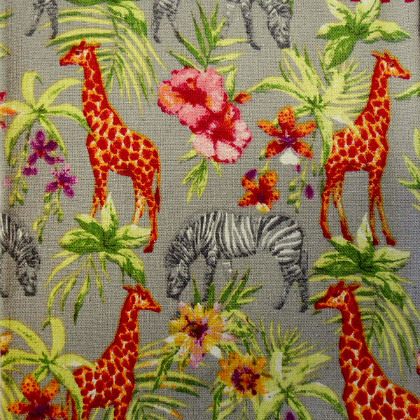 Colourful jungle pattern with giraffes and zebras.