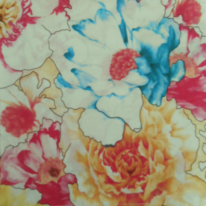 Colourful floral pattern with blue, red, and yellow flowers.